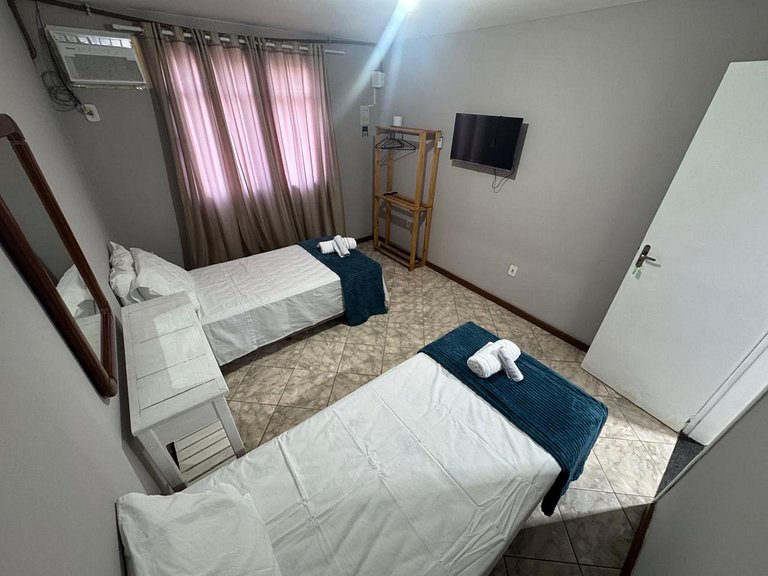 Quarto3 a pé da praia na Rua do comércio Recreio