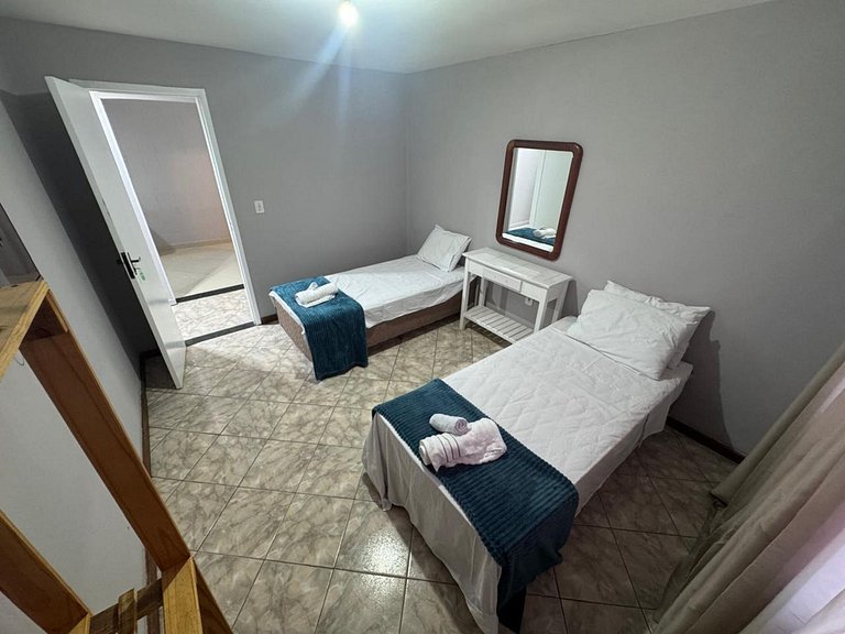 Quarto3 a pé da praia na Rua do comércio Recreio