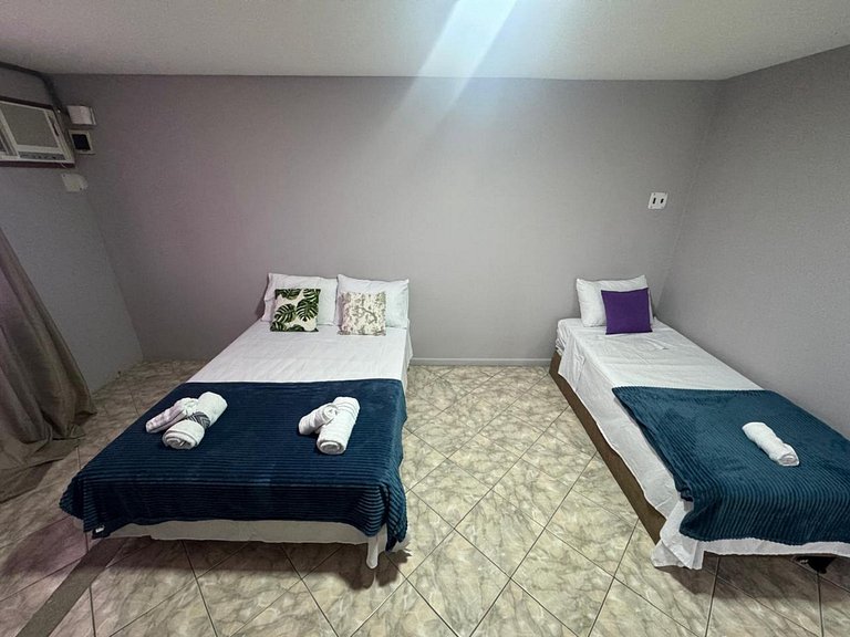 Suite5 a pé da praia na Rua do comércio Recreio
