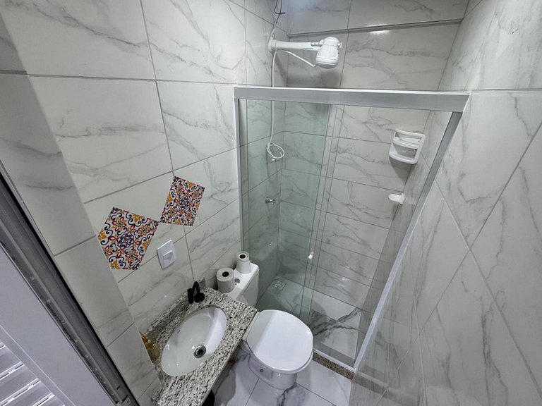 Suite5 a pé da praia na Rua do comércio Recreio