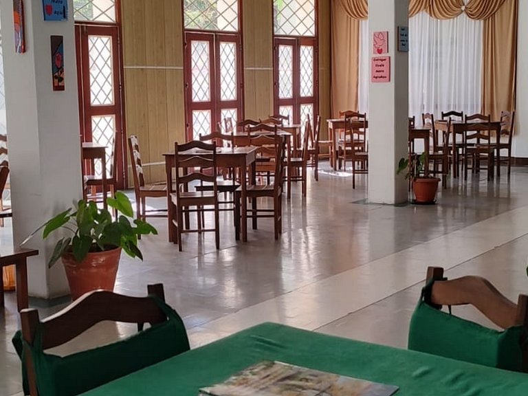 Studio em São Lourenço: Cozinha Completa, Ar, Wifi